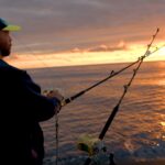 man fishing in Alaska